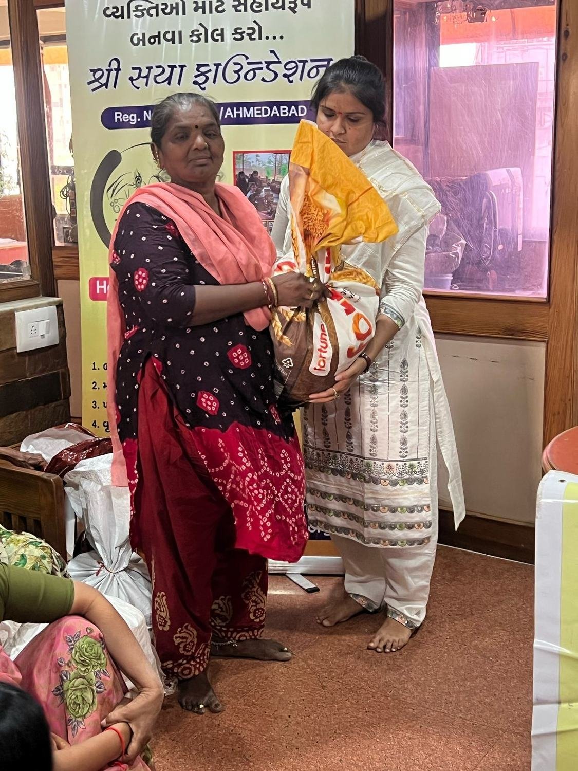 Monthly ration handover — Elder Care & Ration