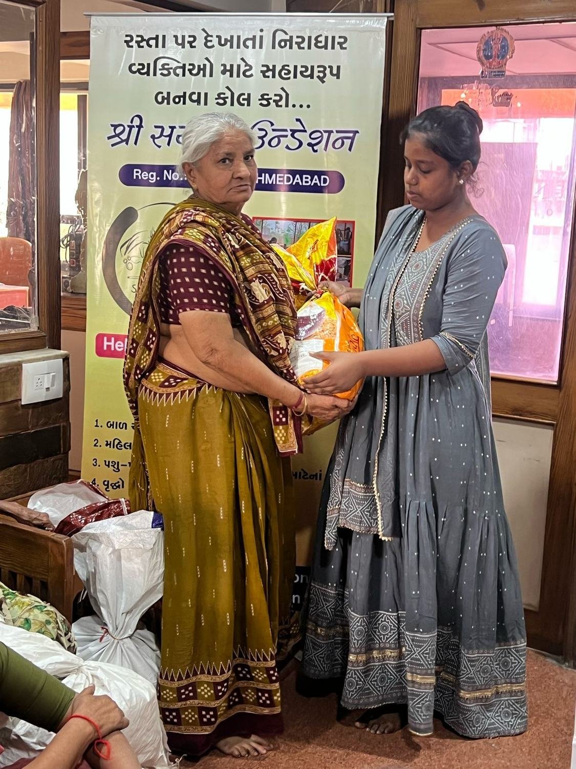 Monthly ration handover — Elder Care & Ration